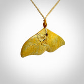 Hand carved New Zealand Flower Jade whale tail pendant.
